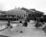 People Chatting Outside by the Pool, A by George Skip Gandy IV