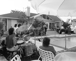 Drummer Playing by the Pool with a Band by George Skip Gandy IV