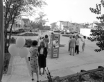 People Gathering in Front of the Information Center, B by George Skip Gandy IV