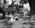 Close View of People Sitting by a Gazebo, A by George Skip Gandy IV