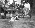 Close View of People Sitting by a Gazebo, B by George Skip Gandy IV