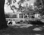 Back View of People Sitting by a Gazebo, B by George Skip Gandy IV