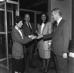 Employees Handing Over Mug at California Federal Bank by George Skip Gandy IV