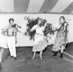 Three People in Romani Dress Playing Violins by George Skip Gandy IV