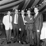 Men in Suits Posing for Photo at a Party by George Skip Gandy IV