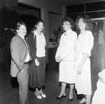 Group of People Posing for a Photo at a Party by George Skip Gandy IV