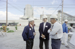 Employees Conversing at a Cargill Fertilizer Inc. Event, B by George Skip Gandy IV