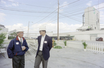 Two Men Conversing at Cargill Fertilizer Inc. Event by George Skip Gandy IV