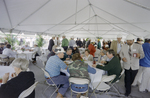 People Eating and Mingling at Cargill Fertilizer Inc. Grand Opening A by George Skip Gandy IV