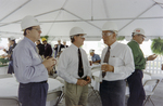 Three Men In Hardhats Conversing at The Cargill Fertilizer Inc. Grand Opening B by George Skip Gandy IV