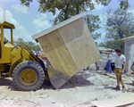 Construction Worker Directing Bulldozer for Carlton Fields, Ward by George Skip Gandy IV