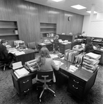 Employees Sitting at Desks at O.H. Carter Co. Inc., A by George Skip Gandy IV