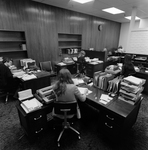 Employees Sitting at Desks at O.H. Carter Co. Inc., B by George Skip Gandy IV