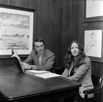 Robert J. Staumbaugh and Cindy Hallgren at a Desk at O.H. Carter Co. Inc., C by George Skip Gandy IV