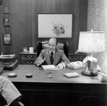 Calvin Carter at His Desk at O.H. Carter Co., A by George Skip Gandy IV