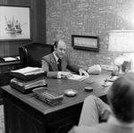 Calvin Carter at His Desk at O.H. Carter Co., C by George Skip Gandy IV