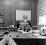 Calvin Carter at His Desk at O.H. Carter Co., E by George Skip Gandy IV