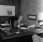 Calvin Carter at His Desk at O.H. Carter Co., G by George Skip Gandy IV