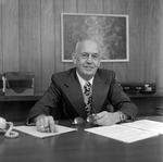 David Beebe Sitting at Desk at O.H. Carter Co. Inc., E by George Skip Gandy IV