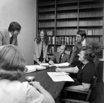 Employees Working Around Conference Table at O.H. Carter Co. Inc., A by George Skip Gandy IV