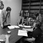 Employees Working Around Conference Table at O.H. Carter Co. Inc., B by George Skip Gandy IV