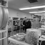 Calvin Carter Looking at Clipboard in Computer Room, A by George Skip Gandy IV