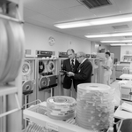 Calvin Carter Looking at Clipboard in Computer Room, E by George Skip Gandy IV