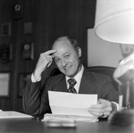 Calvin Carter at His Desk at O.H. Carter Co., T by George Skip Gandy IV