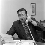 Man Talking on Phone at O.H. Carter Co. in Tampa, Florida, C by George Skip Gandy IV