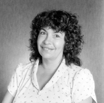 Woman with Dark Curly Hair from O.H. Carter Co. in Tampa, Florida, A by George Skip Gandy IV