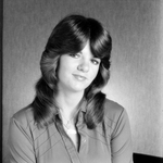 Woman with Seventies Blowout Hairstyle, O.H. Carter Co. in Tampa, Florida, F by George Skip Gandy IV