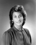 Woman with Striped Blouse at O.H. Carter Co. in Tampa, Florida, D by George Skip Gandy IV