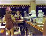 Woman Tending Bar, B by Skip Gandy