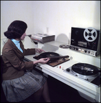 Woman Playing Vinyl Record, B by Skip Gandy