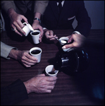 Group With Coffee Cups by Skip Gandy