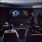 Seated Group in Screening Room, A by Skip Gandy