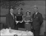 Four People Pose For Photo at Florence Champlin Advertising Award Luncheon by Skip Gandy