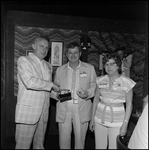 Guests Pose With Honors and Awards at Chevron Employee DInner, G by George Skip Gandy IV