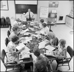 Students Work in Chevron Service Station Management Class, N by Skip Gandy