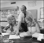 Students Work in Chevron Service Station Management Class, Q by Skip Gandy