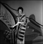 Woman Modeling Fur Coat Near Staircase, A by George Skip Gandy IV