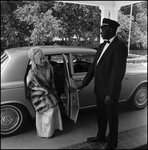 Woman in Chinchilla Fur Coat by Chinchilla Fur Producers and Chauffeur, A by George Skip Gandy IV