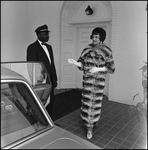 Woman Modeling Chinchilla Fur Coat in Front of Chauffeur Holding Car Door Open, A by George Skip Gandy IV