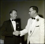 Handshake Between Florida Chiropractic Association Outgoing President and Attendee, Tampa, Florida, A by George Skip Gandy IV