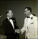 Handshake Between Florida Chiropractic Association Outgoing President and Attendee, Tampa, Florida, B by George Skip Gandy IV