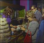 People Holiday Shopping at a Store, Tampa, Florida, C by George Skip Gandy IV