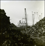 Cargo Ship Clearing Debris From Port Using Cranes, D by George Skip Gandy IV