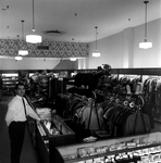 Employee Working at Clark's Credit Clothier Store, Tampa, Florida by George Skip Gandy IV