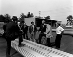 Men Discussing Business, A by George Skip Gandy IV