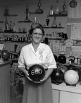 Ada Basye With a Bowling Ball, Tampa, Florida by George Skip Gandy IV